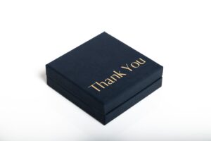 Black box with "Thank You" in gold.