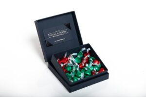 Box of assorted wrapped candies.