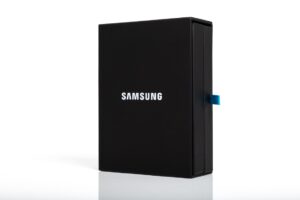 Black Samsung box with blue tab.