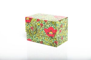 Floral-patterned box with red flowers.
