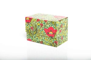 Floral patterned decorative box with red flowers.