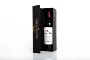 Wine bottle in elegant black gift box.