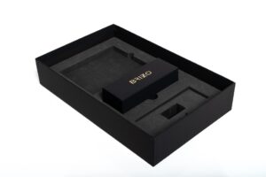 Black packaging box with foam interior insert.