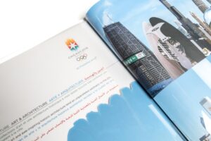 Open magazine with Chicago architecture images.