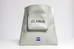 Gray bag with "Clarus" and "Zeiss" logo.