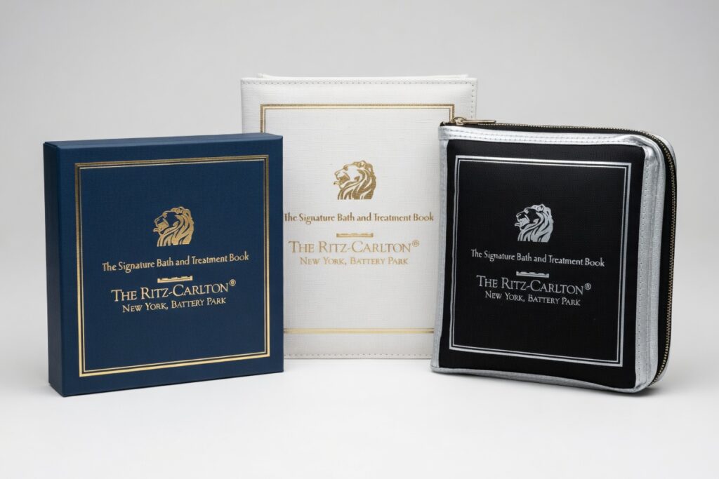 Hybrid custom packaging including rigid box and sewn pouch manufactured under one roof by Petra and Holum Chicago