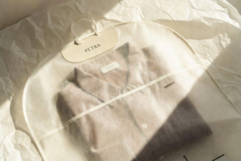Eco-friendly garment bags illustrating sustainable packaging for the fashion industry.